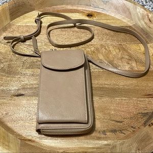 Tan crossbody clutch